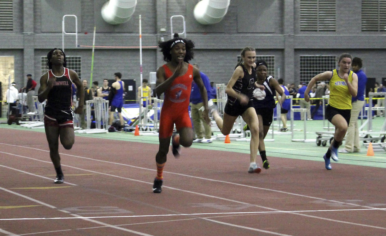 Bloomfield High School transgender athlete, wins the final of the 55-meter dash over transgender athlete Andraya Yearwood, far left, and other runners in the Connecticut girls Class S indoor track meet at Hillhouse High School in New Haven, Conn.
