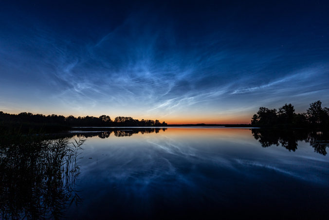 Click to enlarge Noctilucent clouds over Riga
