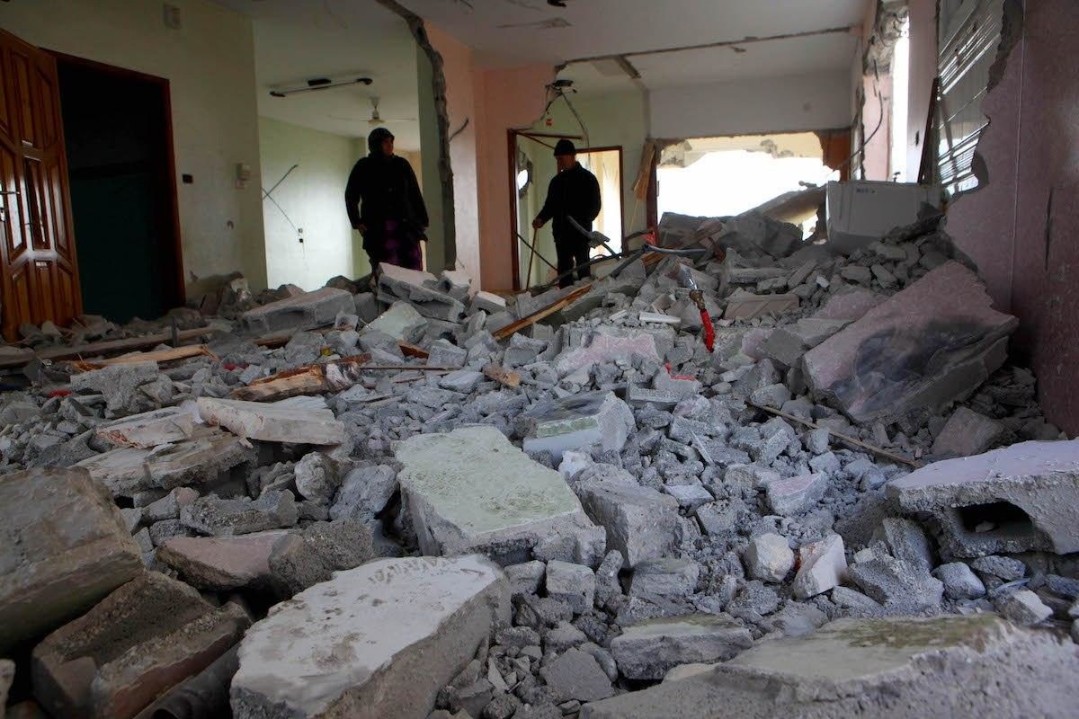 Click to enlarge Palestinian home demolished by Israel