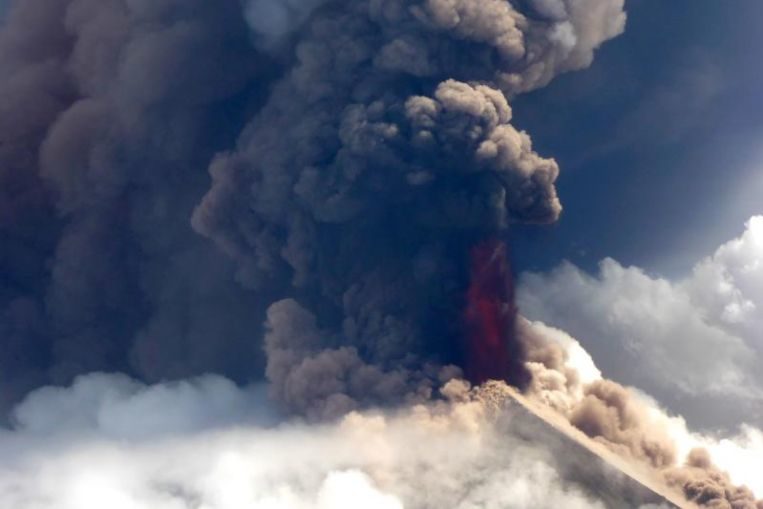 A pilot for Niugini Helicopters flying near the crater witnessed a column of lava spurting vertically into the equatorial sky, along with ash that has been belching since early morning on June 26, 2019