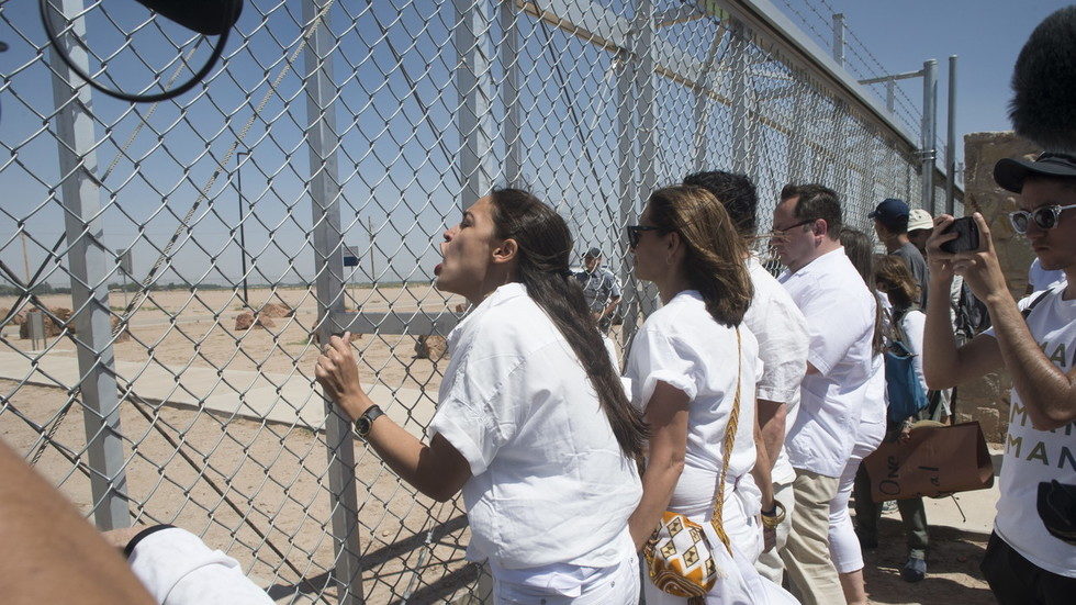 Click to enlarge Ocasio Cortez AOC concentration camp immigrant migrant parking lot