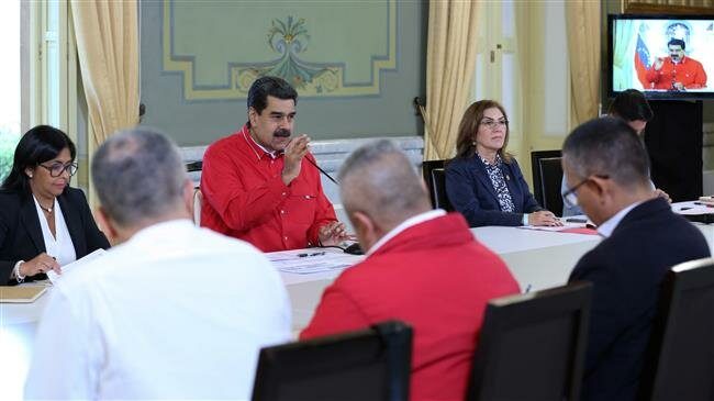 Click to enlarge maduro staff meeting