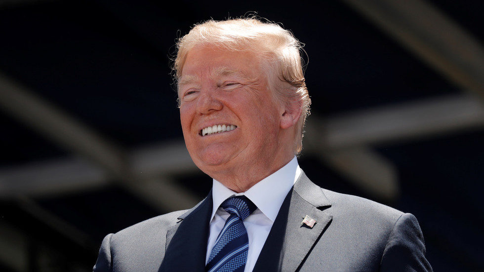 Click to enlarge smiling Trump