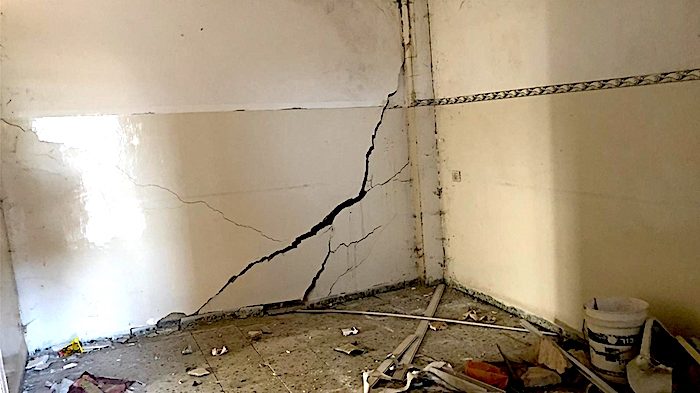 Click to enlarge cracked wall