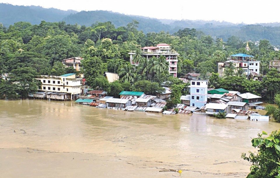 The Sangu bursts its banks and inundates homes and business in Bandarban town.