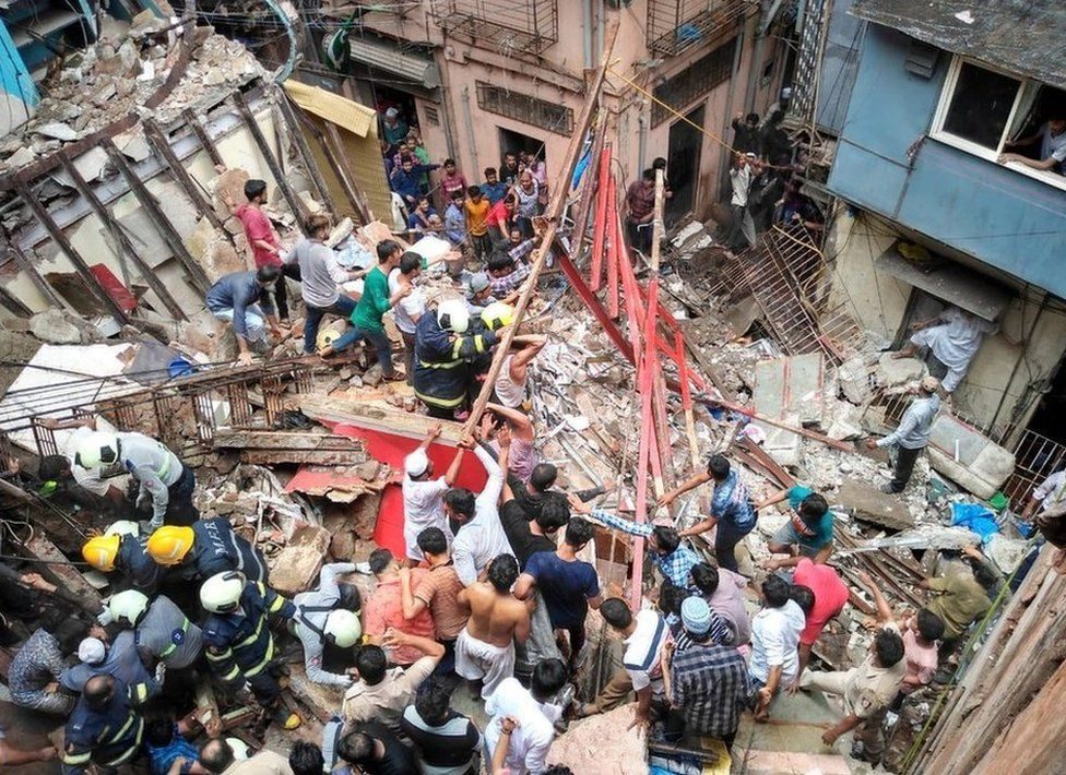 Click to enlarge India building collapse