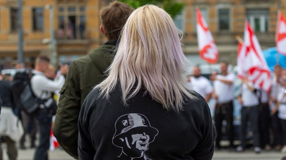 Click to enlarge Demonstrators take part at a right-wing NPD party Mayday rally