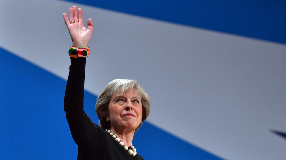 Click to enlarge Theresa May