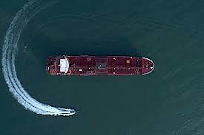 Click to enlarge Boat circles Tanker