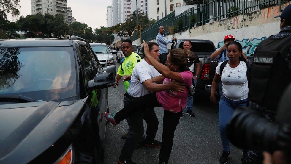 Click to enlarge guaido car attacked venezuela