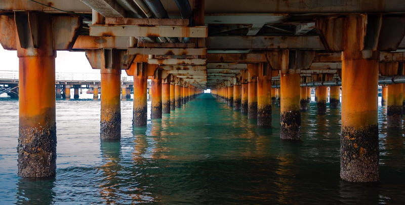 rusted bridge supports