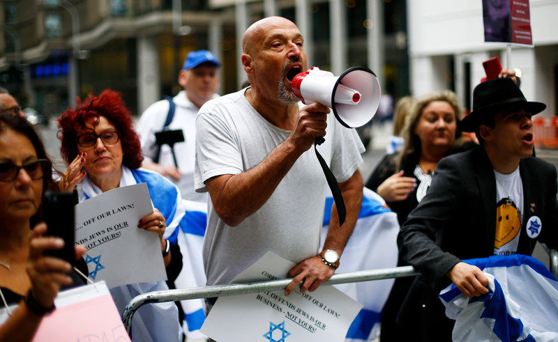 Click to enlarge antisemitism protester britain UK labour party