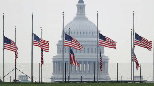Click to enlarge Flags flying half-mast at the White House