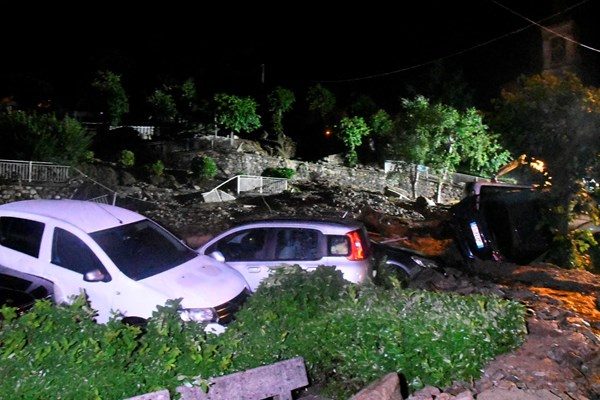 Overturned cars in Casargo, Italy