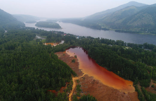 Polluted reservoir closed copper mine Khakassia Russia