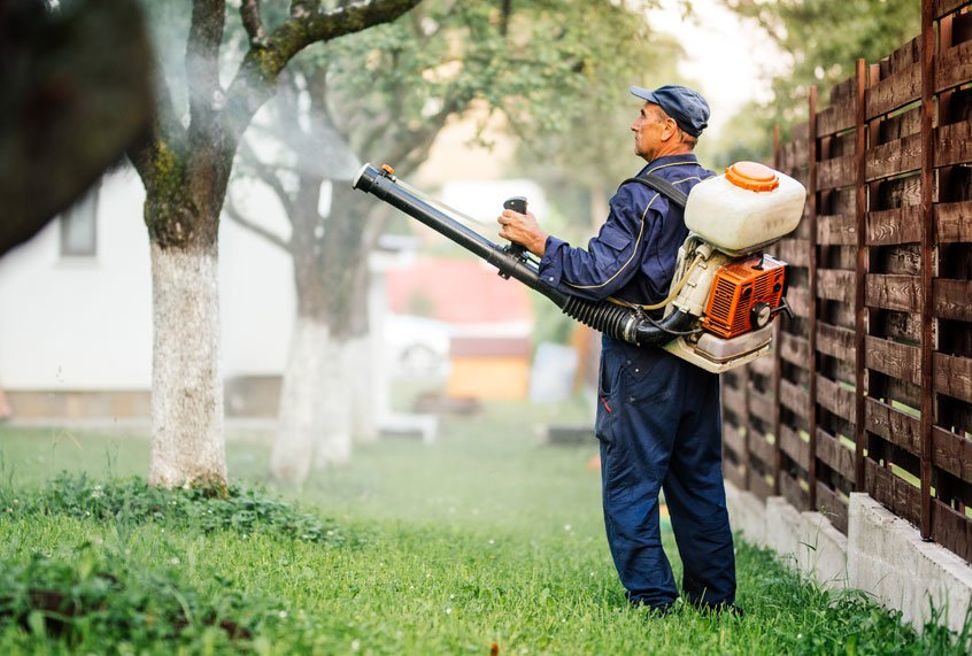Click to enlarge spraying pesticides