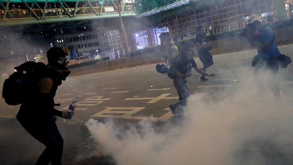 Click to enlarge police fired tear gas to disperse the demonstration at Sham Shui Po