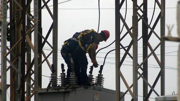 Man with electrical wires