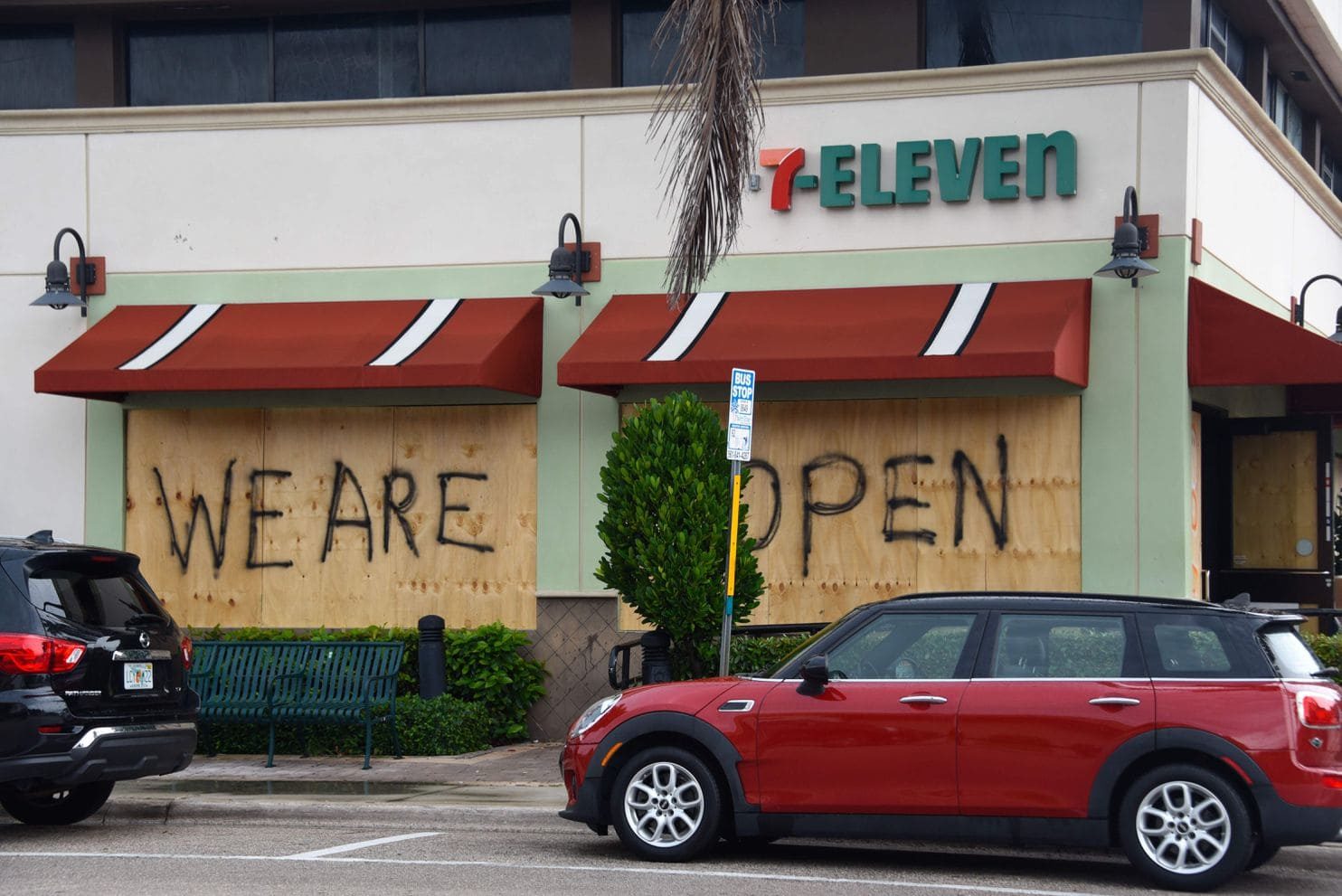 Shops windows are seen boarded up as Hurricane Dorian approaches in Deerfield Beach, Florida on September 2, 2019
