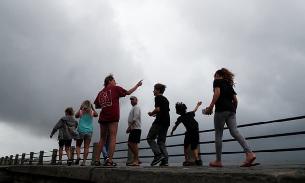 Click to enlarge A family in Charleston before the arrival of Hurricane Dorian.