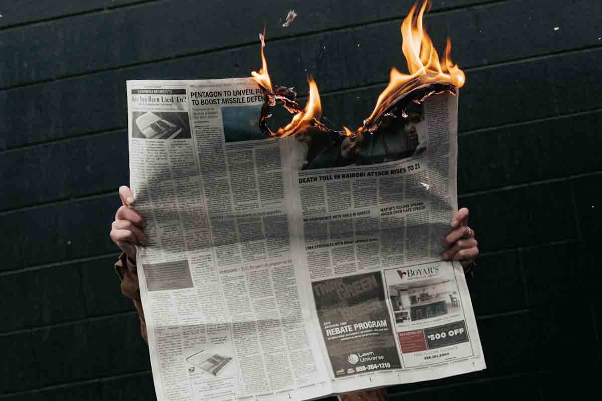 burning newspaper