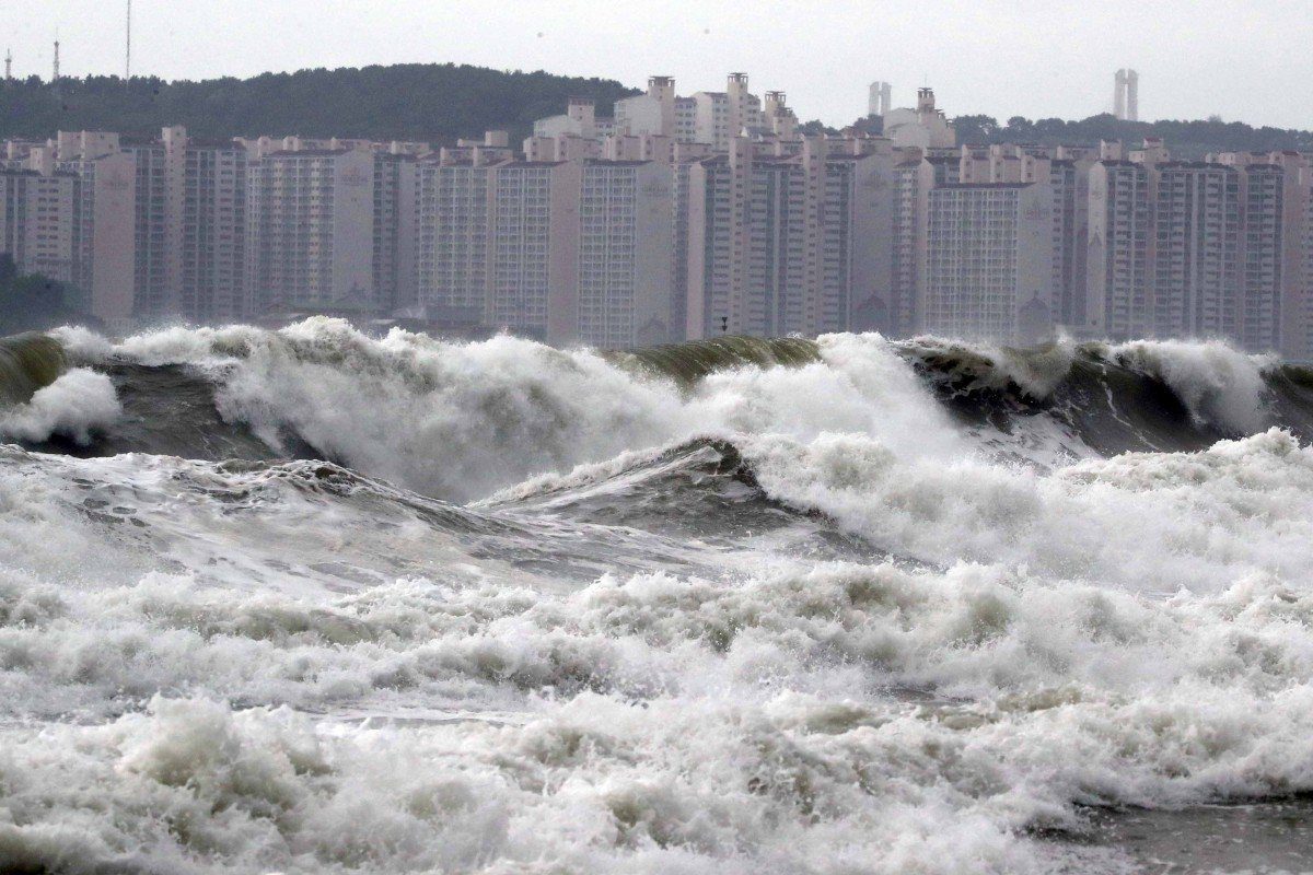 High waves batter a beach in the South Korean port city of Busan