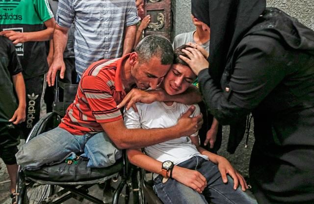 Click to enlarge Snipers murder Palestinians Gaza