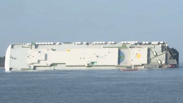 cargo ship on its side