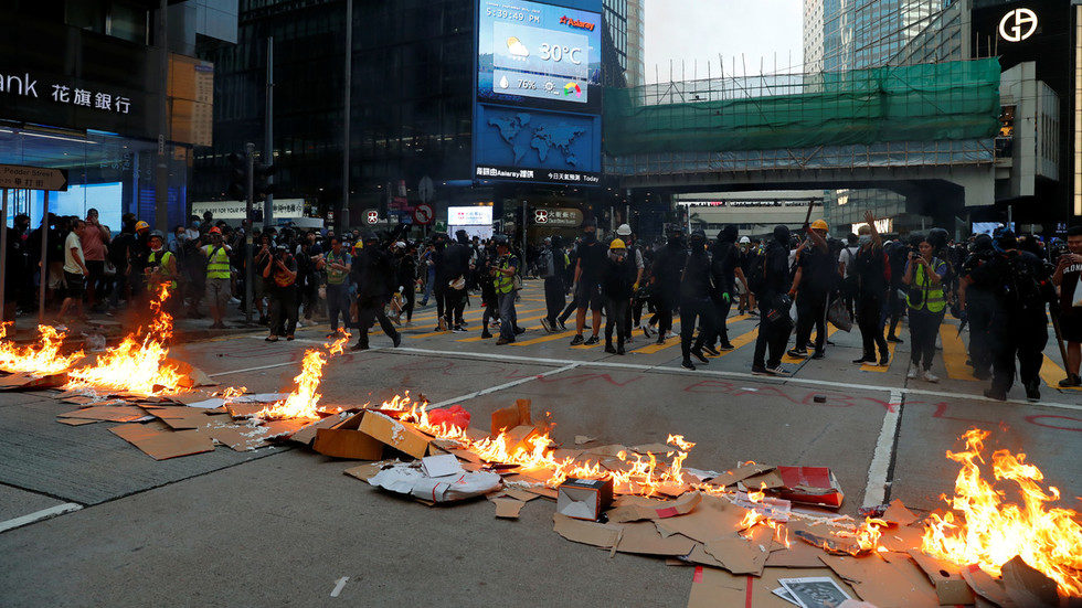 Protesters burn debris in the street of Hong Kong sept 2019