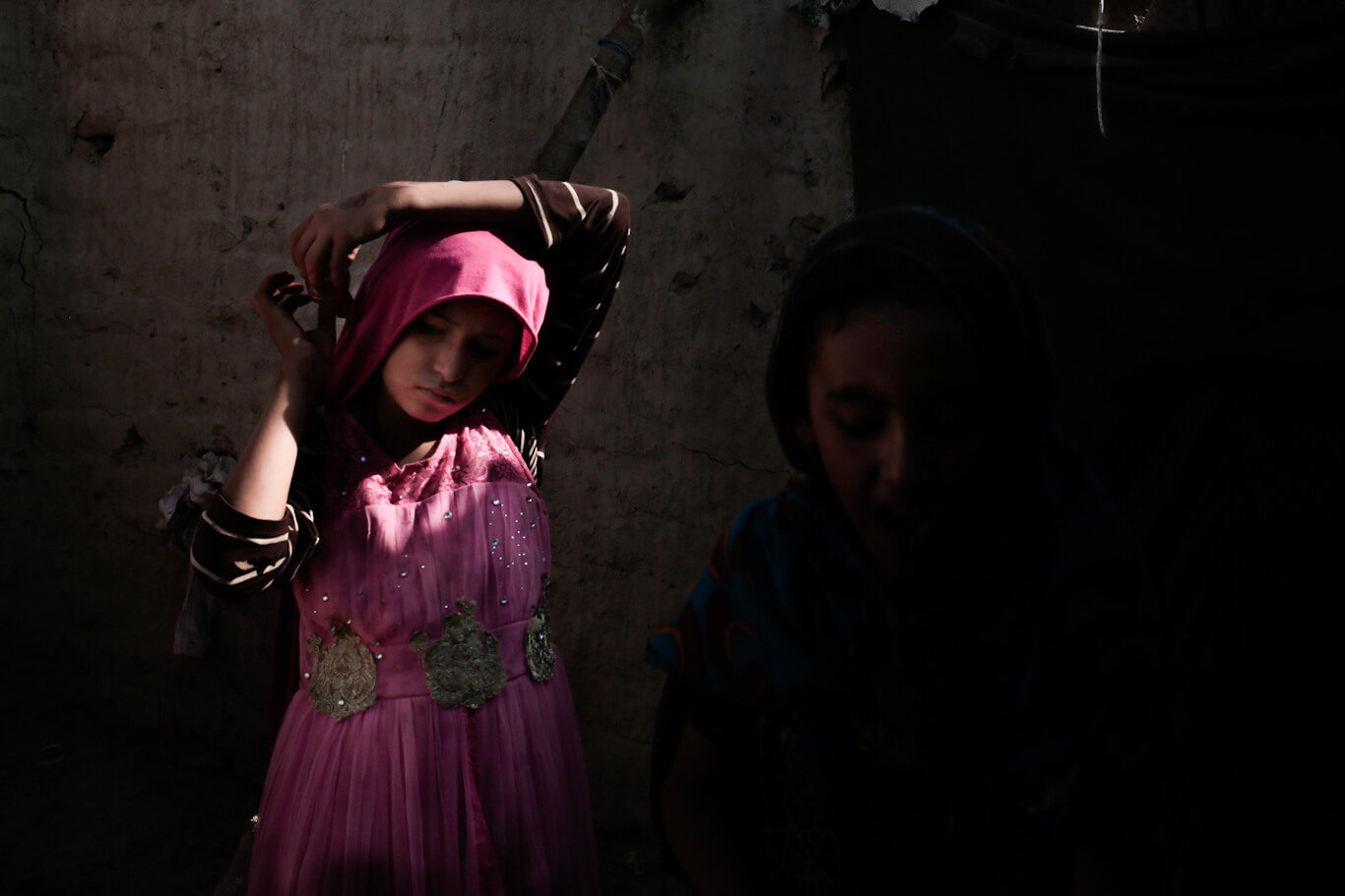 Click to enlarge A displaced girl stands in her shelter in Abyan, Yemen, Feb. 9, 2018.