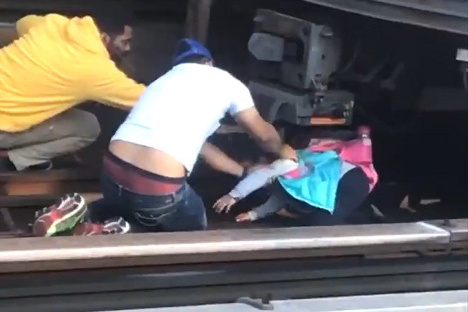 NYC bystanders rescuing girl after dad’s subway suicide