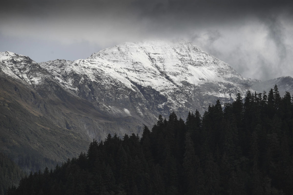 Snow on the Observation Peak lights up in the sun on Thursday, Sept. 26, 2019.