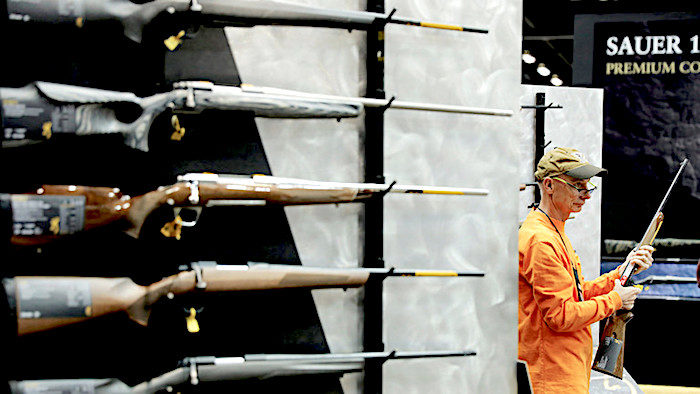 Click to enlarge Guns and man/rifle