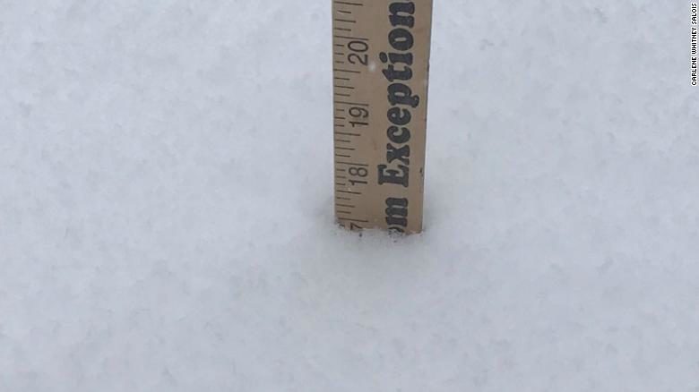 Click to enlarge Carlene Whitney Salois took pictures of a ruler in the snow during a storm in Montana.