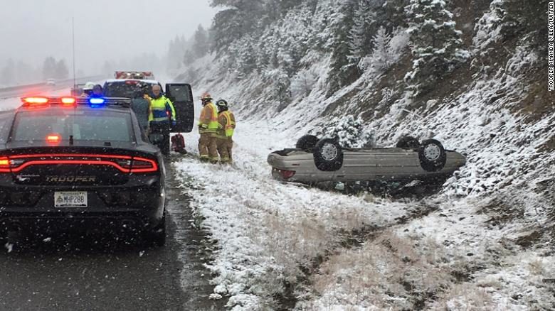 Montana Highway Patrol Trooper Amanda Villa caught this image of a car flipped over in harsh weather in Montana.