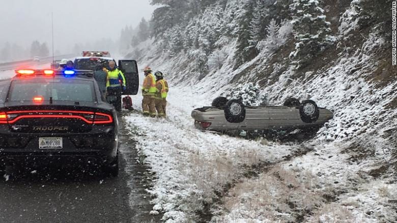 Click to enlarge Montana Highway Patrol Trooper Amanda Villa caught this image of a car flipped over in harsh weather in Montana.