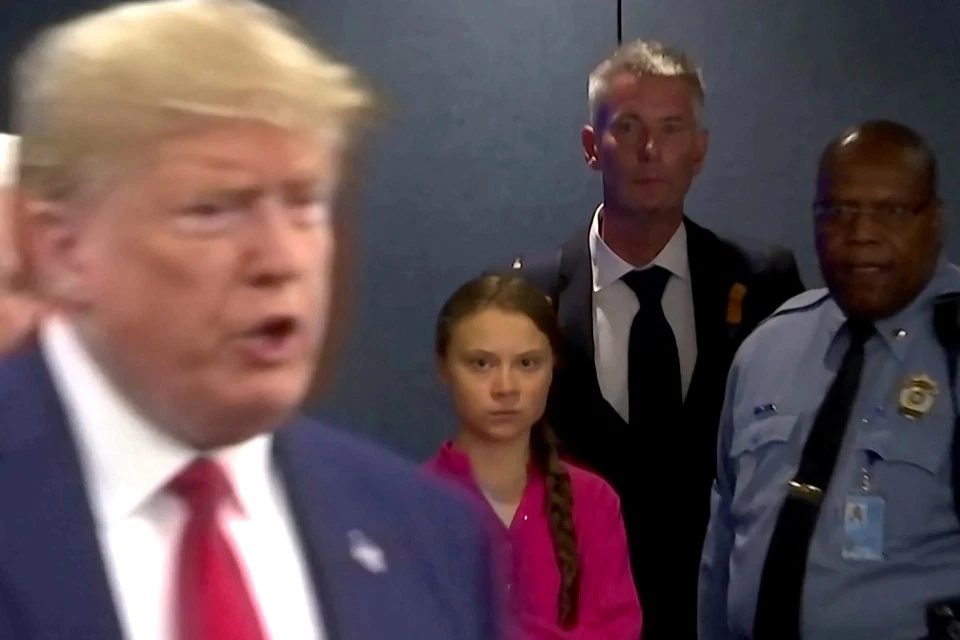 Click to enlarge Greta scowls at Trump