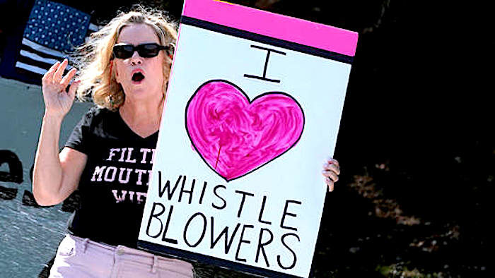 Click to enlarge Woman/whistleblowers