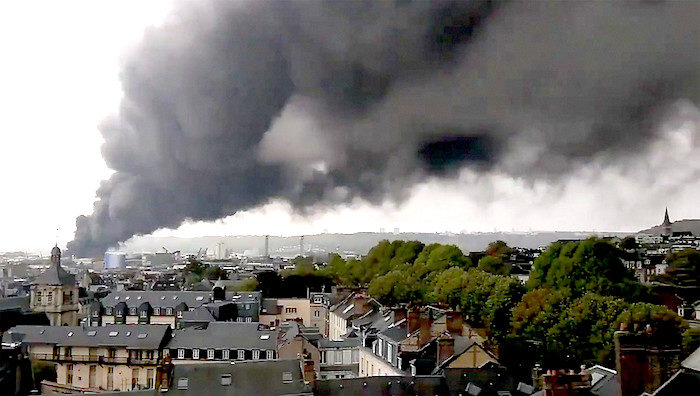 Click to enlarge Smoke billows
