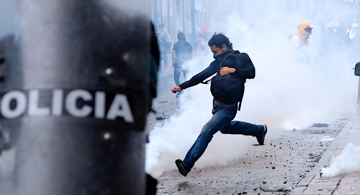 Click to enlarge Ecuador protester