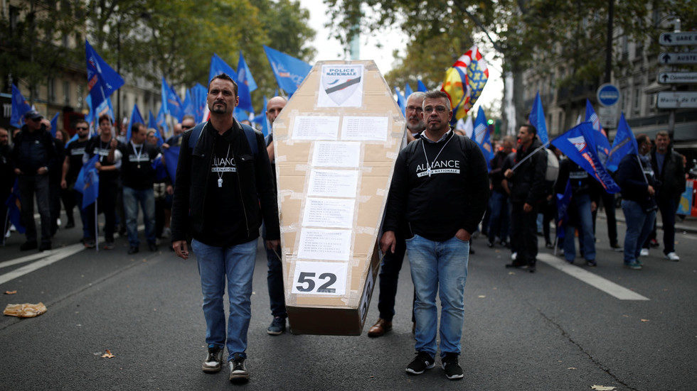 Click to enlarge French police officers at the