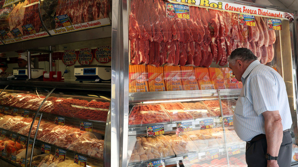 Click to enlarge A man buys meat from a butcher shop in Santo Andre, Sao Paulo state, Brazil October 1, 2019.