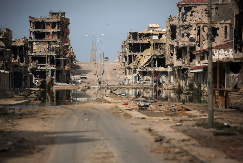 buildings ravaged by fighting in Sirte, Libya.