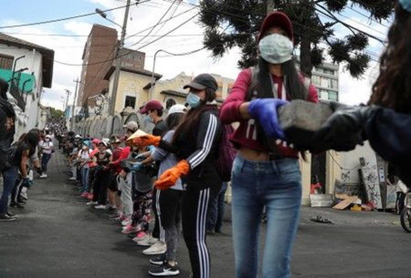 protests clean streets quito