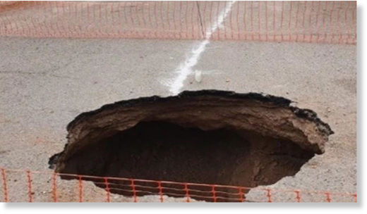 A man reportedly fell into this sinkhole late Monday afternoon.