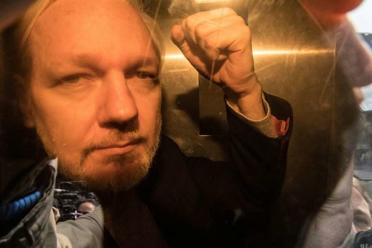 assange defiant