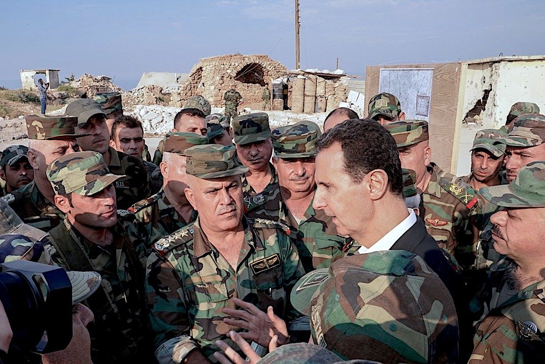 Click to enlarge Assad and GroupTroops