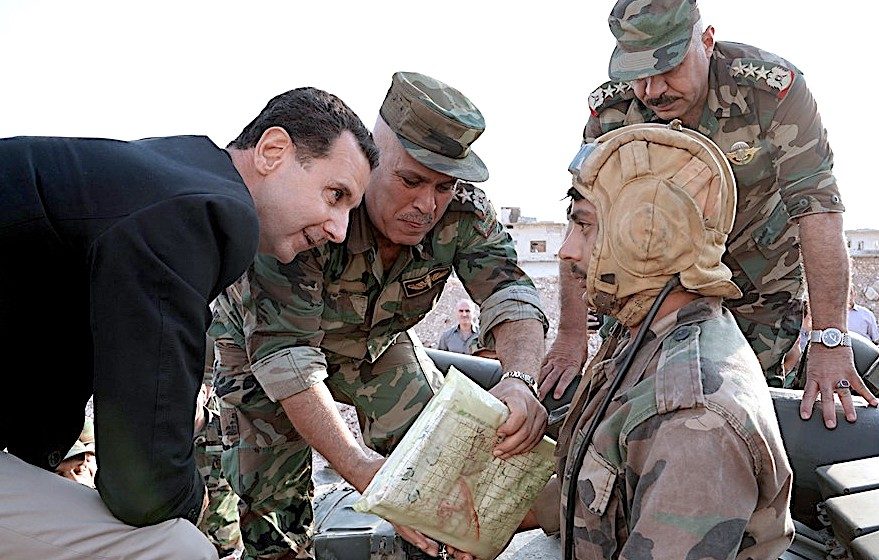 Click to enlarge Assad/troopwithHelmet