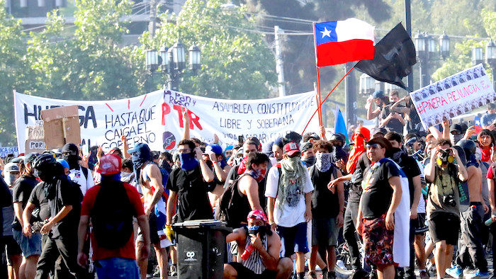 Click to enlarge Demonstrators gather