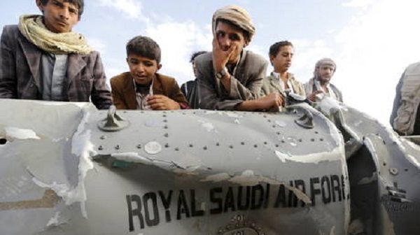 People in Yemen near downed fighter jet